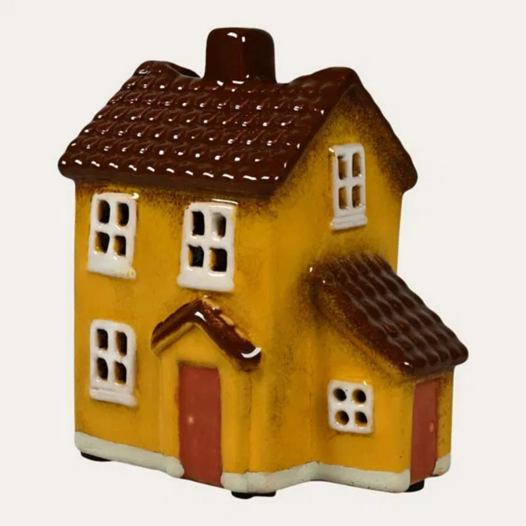 Det Gamle Apotek Lichthaus aus Keramik gelb mit Anbau